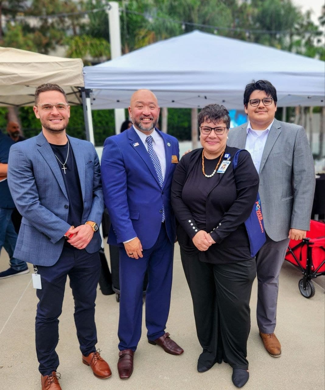 Team members networking at a community event